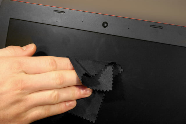 use a microfiber cloth or a dry eraser while cleaning screen